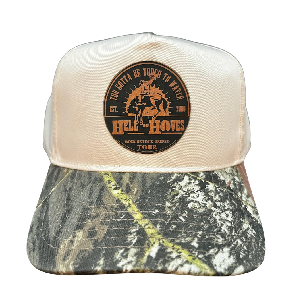 Mossy oak canvas snapback with leather Hell on Hooves patch.