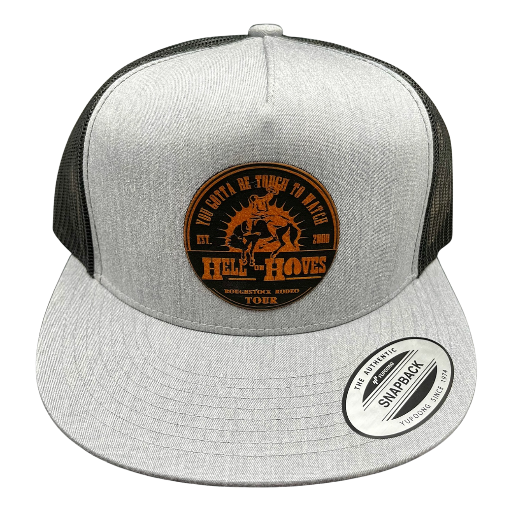 Gray and black trucker hat with 'Hell of the Hoves' logo on a white background