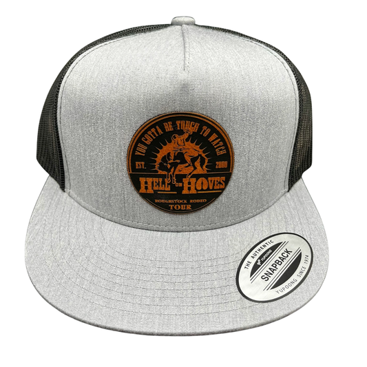 Gray and black trucker hat with 'Hell of the Hoves' logo on a white background